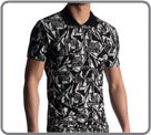T-shirt polo. Un puissant motif graphique noir-blanc tricot dans le jersey de...