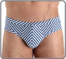 Alexis Mabille design - The Bomec line wants to be simple with graphic sets of fine optical stripes exploiting the shapes of the body. The high buttock, conqueror and elegant pouch, the line raises the body of the man.