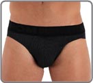 Incredible : an elasthan Meryl Tactel material with a finely woven sweater effect. Ultra soft jacquard waistband with embossed style lettering. A unique and elegant winter look. Unlined front pouch.