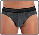 New caviar fabric, a bestseller for the past two seasons, now a permanent material. A black/white caviar effect, obtained using a special weave of two
different colour threads. A very on-trend and unconventional permanent product. Lined at the front.