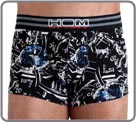 A print with white deconstructed stop watches on a black ground
enhanced with colour touches. A black and grey microfibre waistband with a touch of red for a great look and maximum comfort.