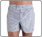 Woven boxer. Plain colours and stripes are combined. Some chic and comfortable products enhanced by embroideries and the H label. A range with a 60’s look ideal for business men.