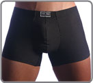 Elegante and chic line. Soft white strip on a black cotton base. Little coiled waistband.