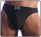 Elegante and chic line. Soft white strip on a black cotton base. Little coiled waistband.