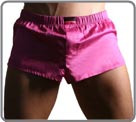 Beautiful innovation associating mini boxershorts in glossed cotton with an internal suspending rod (partial brief in front of). Look of sexy pants and brief support in the same product. Slits of ease on the sides. Front pouch with fake opening.