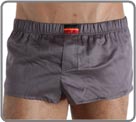 Beautiful innovation associating mini boxershorts in glossed cotton with an internal suspending rod (partial brief in front of). Look of sexy pants and brief support in the same product. Slits of ease on the sides. Front pouch with fake opening.
