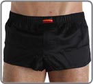 Beautiful innovation associating mini boxershorts in glossed cotton with an internal suspending rod (partial brief in front of). Look of sexy pants and brief support in the same product. Slits of ease on the sides. Front pouch with fake opening.