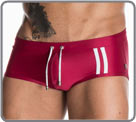 Slip de bain couvrant avec cordon de serrage. Matire satine. Coupe proche du...