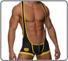 L'association d'un body boxer et d'un jockstrap laissant appara�tre votre torse pour un look d'athl�te . Model noir r�hauss� de jaune sur une mati�re mesh tr�s respirante.