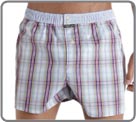 Boxershort 100% cotton combed dyed wire, American cut with back piece, brief inside majority jersey cotton with for a perfect maintenance without compression. Elastic waist band with contrasted fabric, 2 engraved buttons.