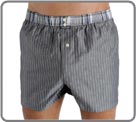 Boxershort 100% cotton combed dyed wire, American cut with back piece, brief inside majority jersey cotton with for a perfect maintenance without compression. Elastic waist band with contrasted fabric, 2 engraved buttons.