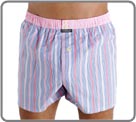 Boxershort 100% cotton combed dyed wire, American cut with back piece, brief inside majority jersey cotton with for a perfect maintenance without compression. Elastic waist band with contrasted fabric, 2 engraved buttons.