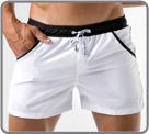 Low-cut swim shorts made of high-end fabric. Contrasting colors on the and on a...
