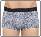 A print mixing boxer, marine anchor, Palm tree, Sun on a polyamide microfiber...