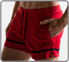 Semi-adjusted shorts made of quick dry sport mesh. In contrasting color. Deep a...